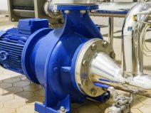 Water Centrifugal pump and motor line with pipe rack in power plant construction site industrial, demineralized water