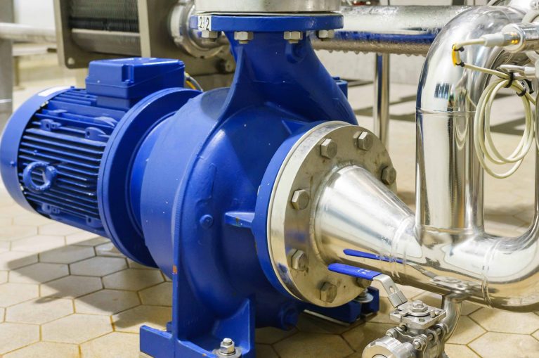 Water Centrifugal pump and motor line with pipe rack in power plant construction site industrial, demineralized water